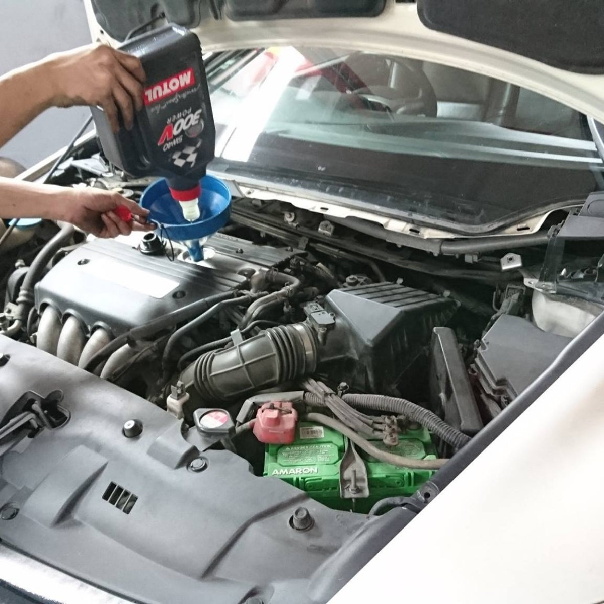 Comprehensive Car Servicing Package with Genuine MOTUL 8100 X-CESS